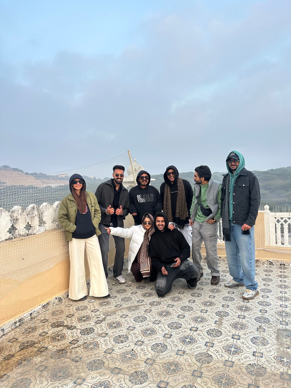 Techno and Travel group sharing a cold morning outdoors