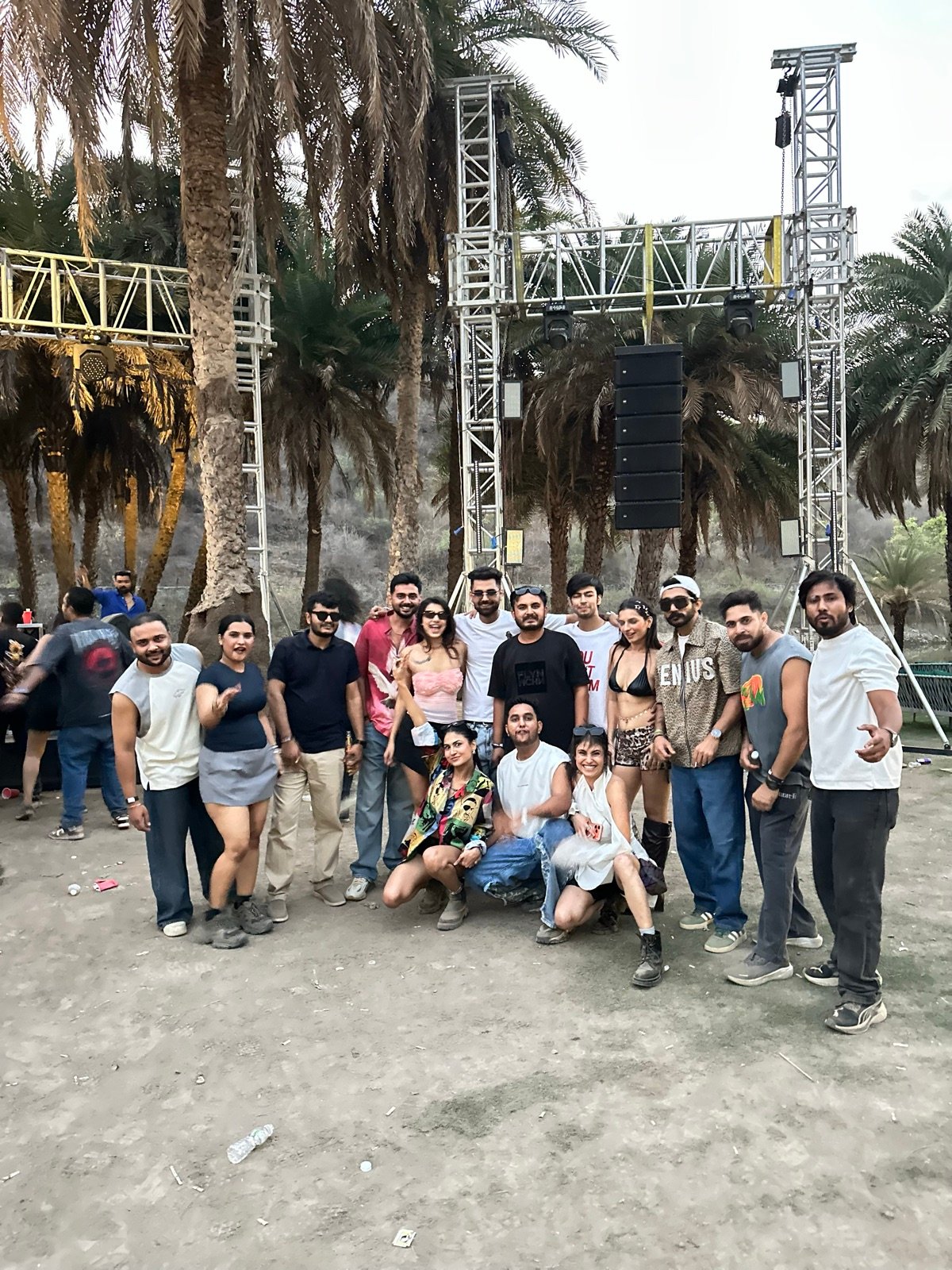 Large Techno and Travel group gathered at an outdoor festival